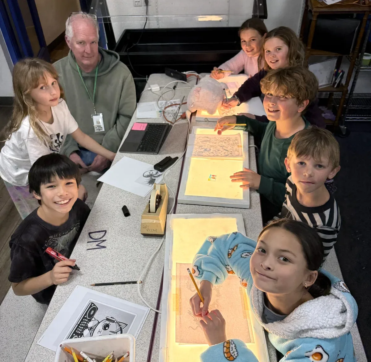 Teacher and children learning together at Bixby School